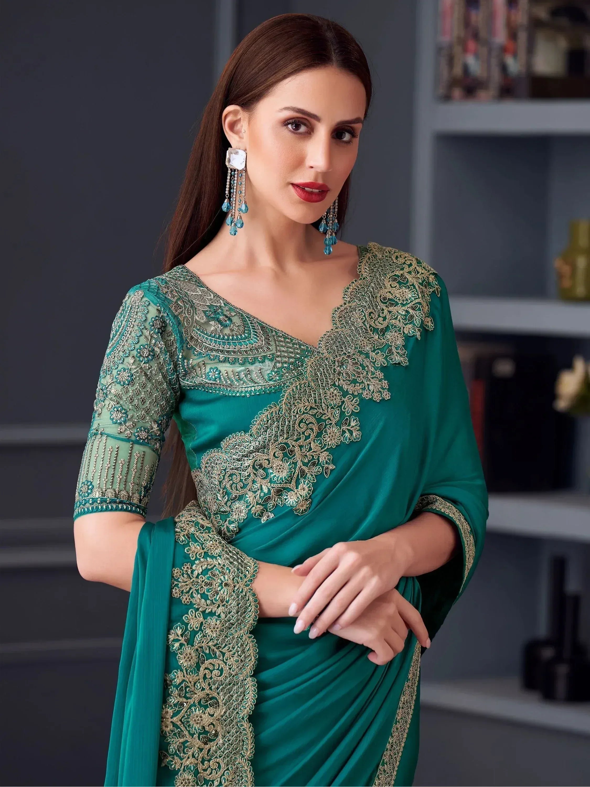 Emerald green designer saree with gold embroidery, perfect for Indian ethnic wear occasions