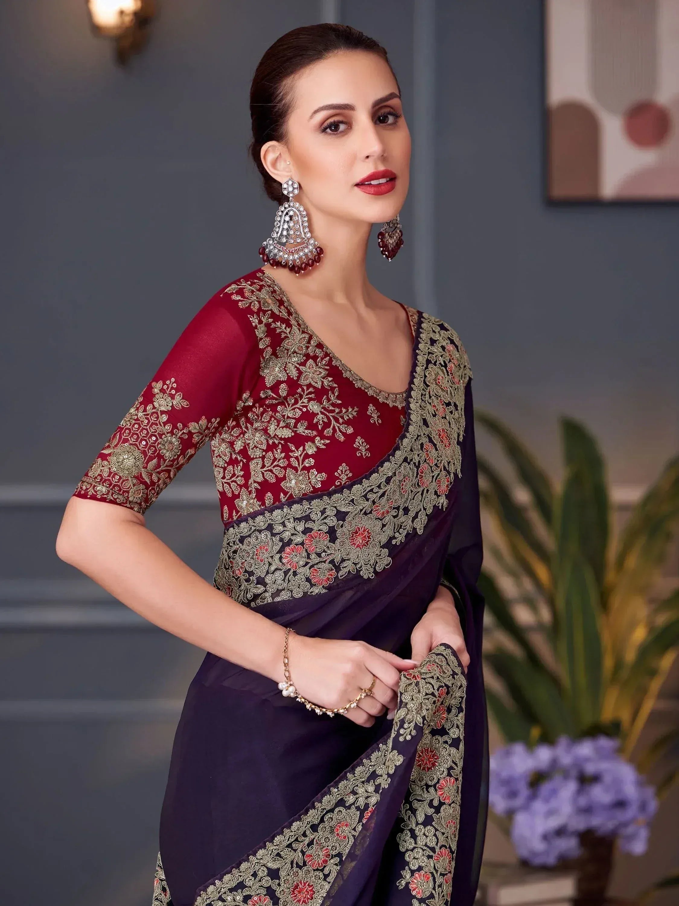 Elegant maroon and navy saree with gold floral embroidery, perfect for Indian ethnic occasions