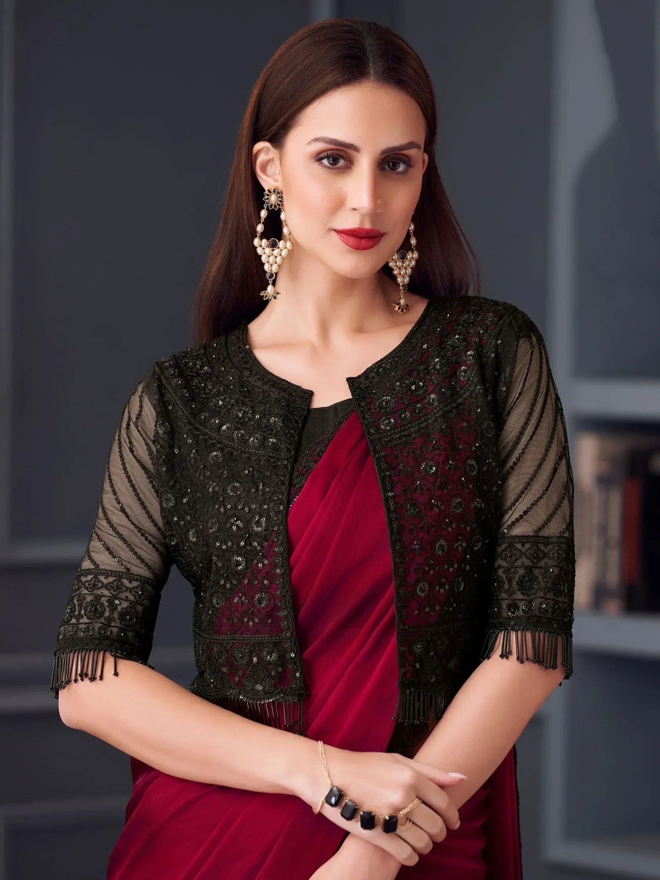 Woman in maroon saree with black embroidered jacket, ethnic wear, designer Indian outfit