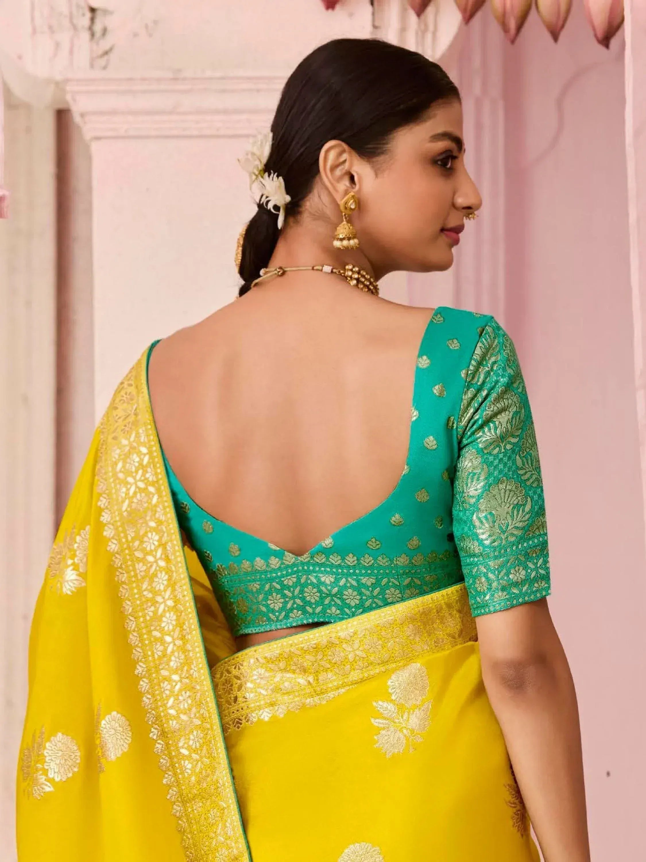 Yellow and green designer saree with gold embroidery and backless blouse, perfect for Indian ethnic occasions