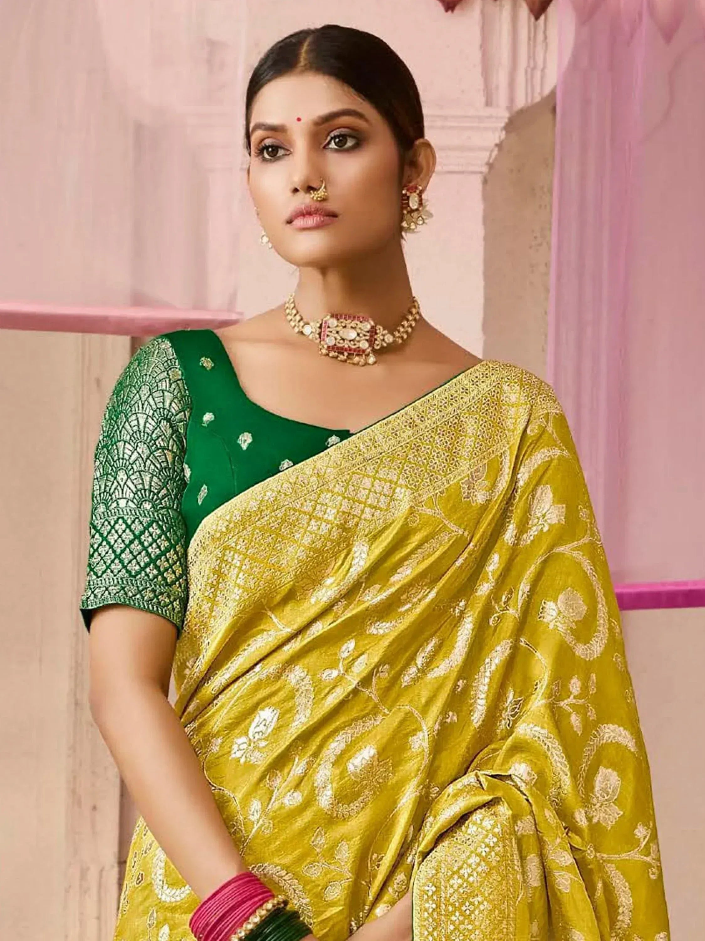 Elegant yellow and green embroidered saree with designer blouse, perfect for Indian ethnic occasions