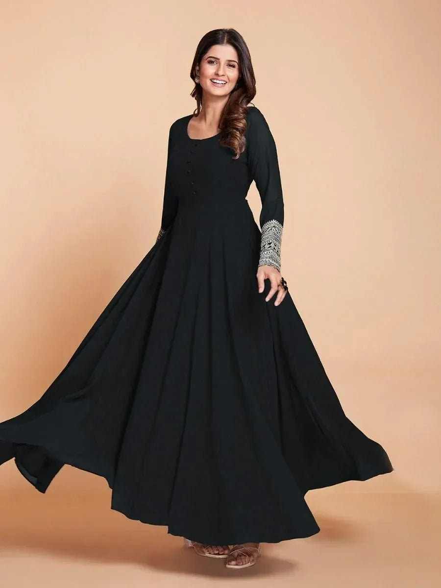 Black ethnic gown with embroidered sleeves, flowing skirt, perfect for Indian occasions