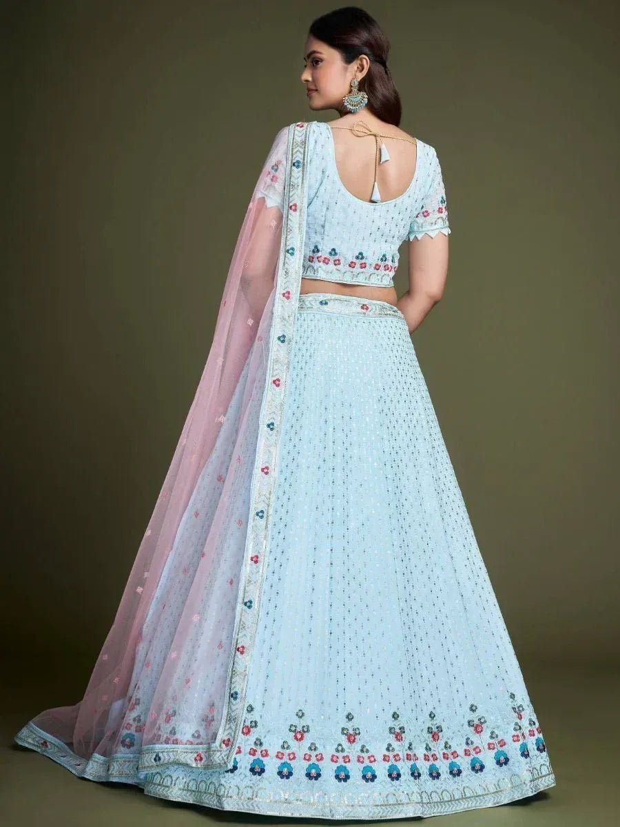 Light blue embroidered lehenga choli with pink dupatta, perfect for Indian ethnic occasions
