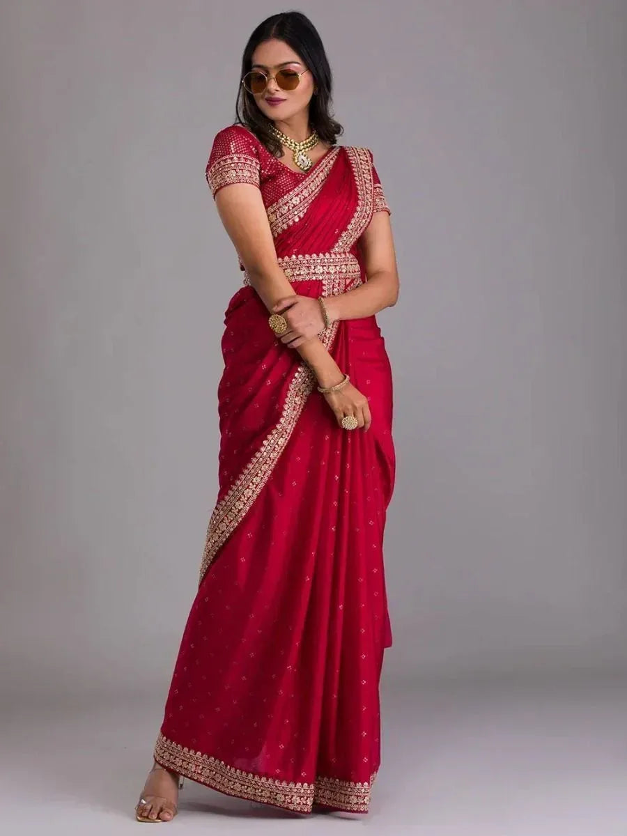 Red embroidered saree with gold border, perfect for Indian ethnic wear occasions