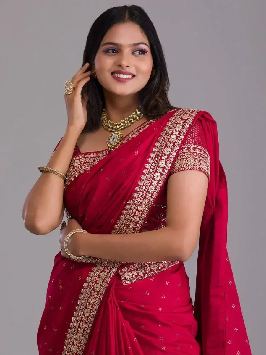 Red embroidered saree with gold detailing, perfect for Indian ethnic wear and festive occasions