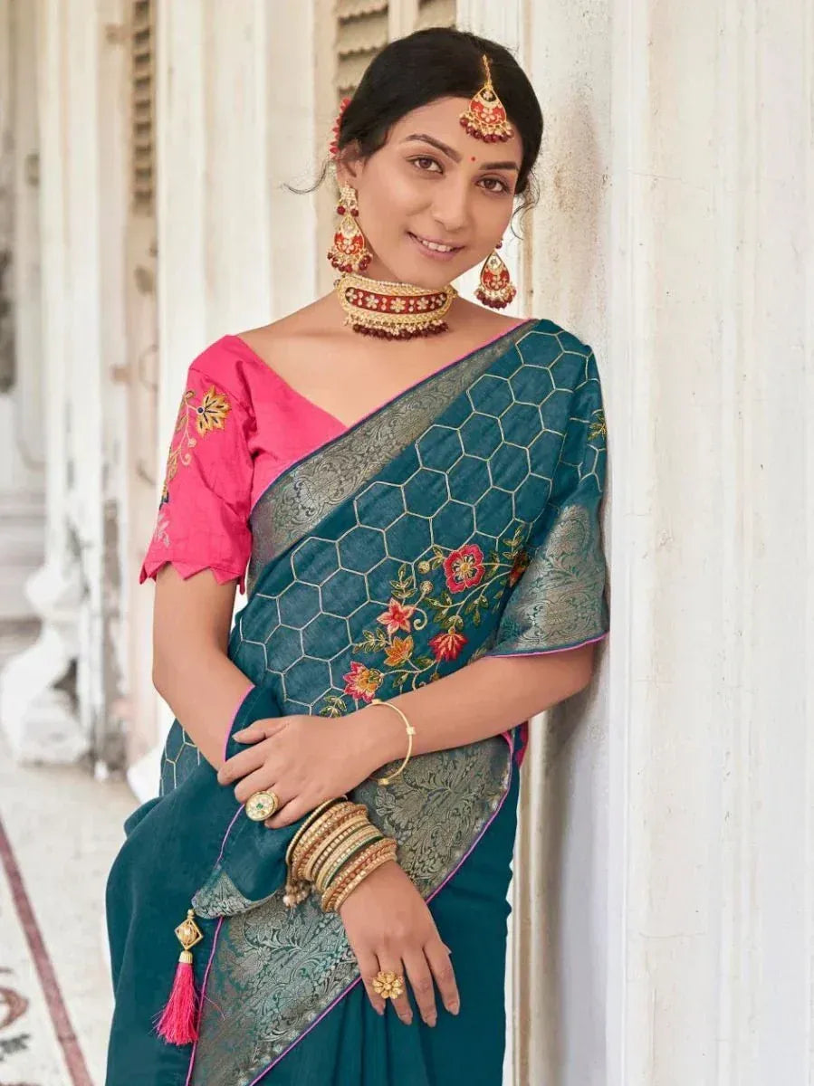 Teal floral embroidered saree with pink blouse, traditional Indian ethnic wear for women