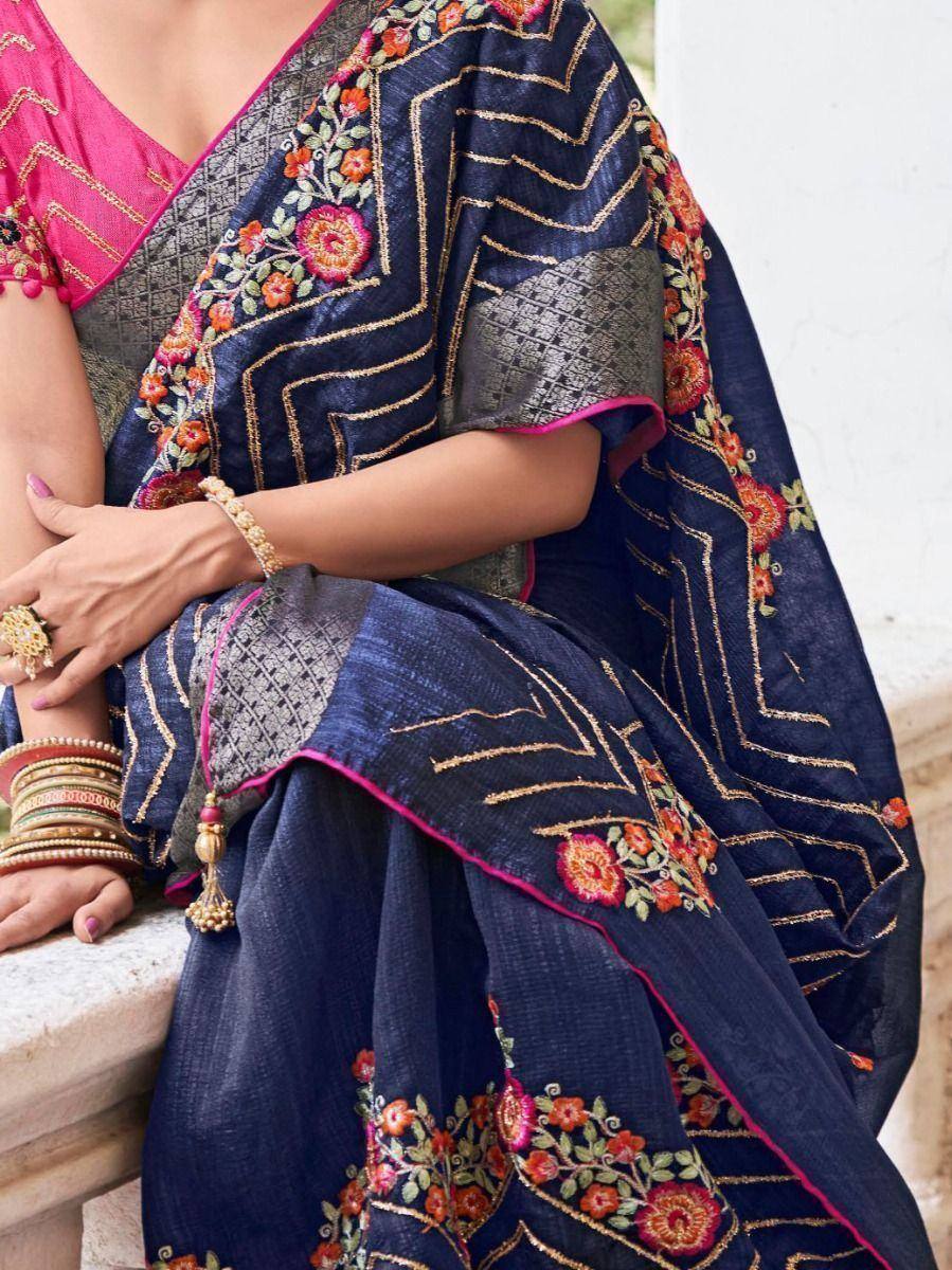 Navy blue embroidered saree with pink blouse, floral gold detailing, perfect for Indian ethnic wear occasions