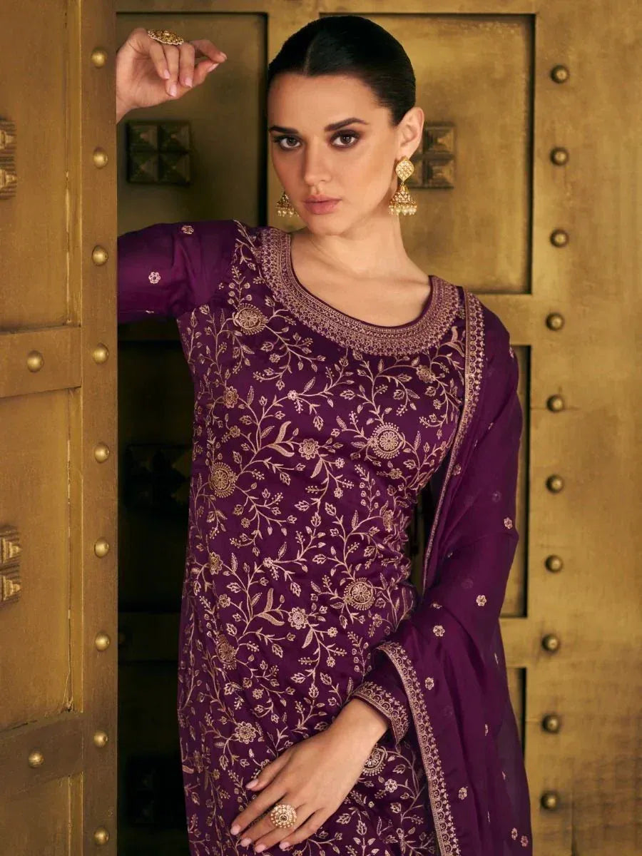 Purple embroidered salwar kameez with gold floral work, perfect for Indian ethnic wear occasions
