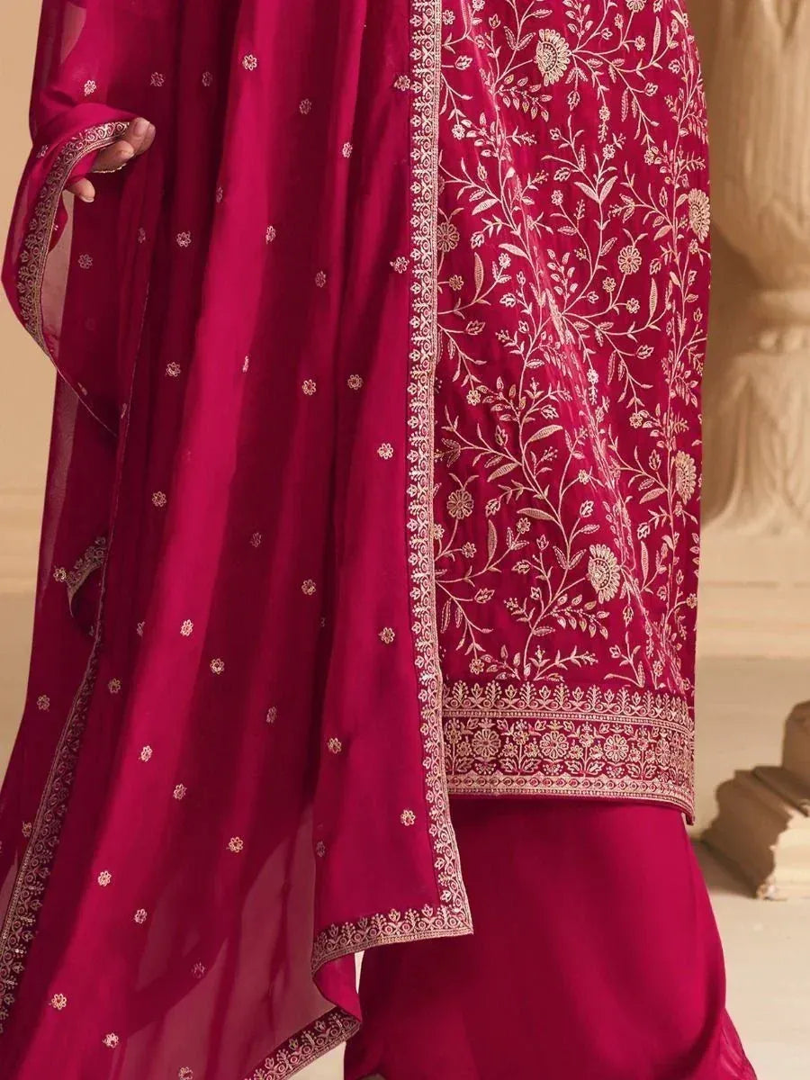 Elegant maroon salwar kameez with gold floral embroidery and sheer dupatta, perfect for Indian ethnic occasions.