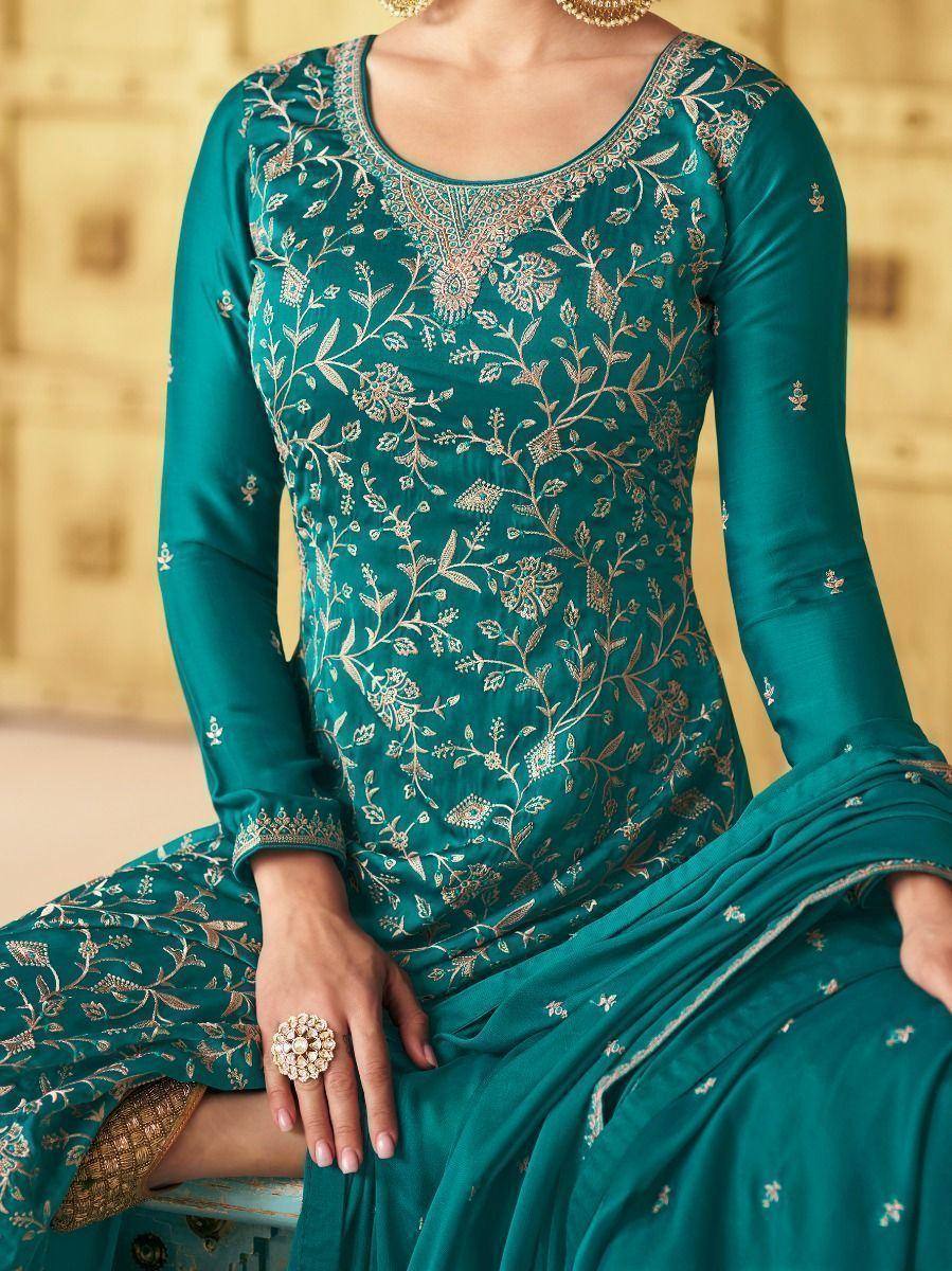 Teal green embroidered salwar kameez with gold floral work, perfect for Indian ethnic wear occasions