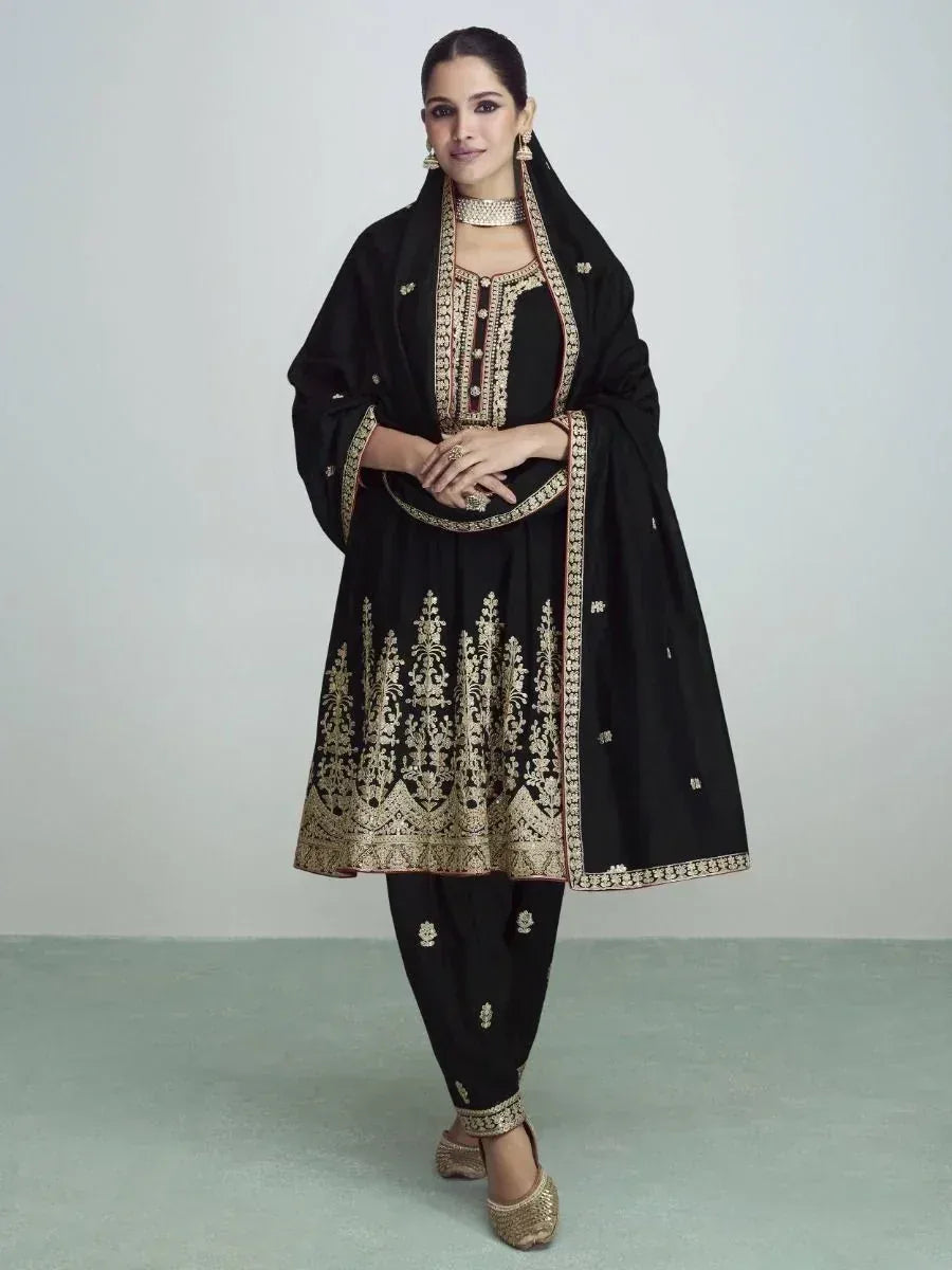 Black embroidered salwar kameez with gold detailing, perfect for Indian ethnic wear occasions