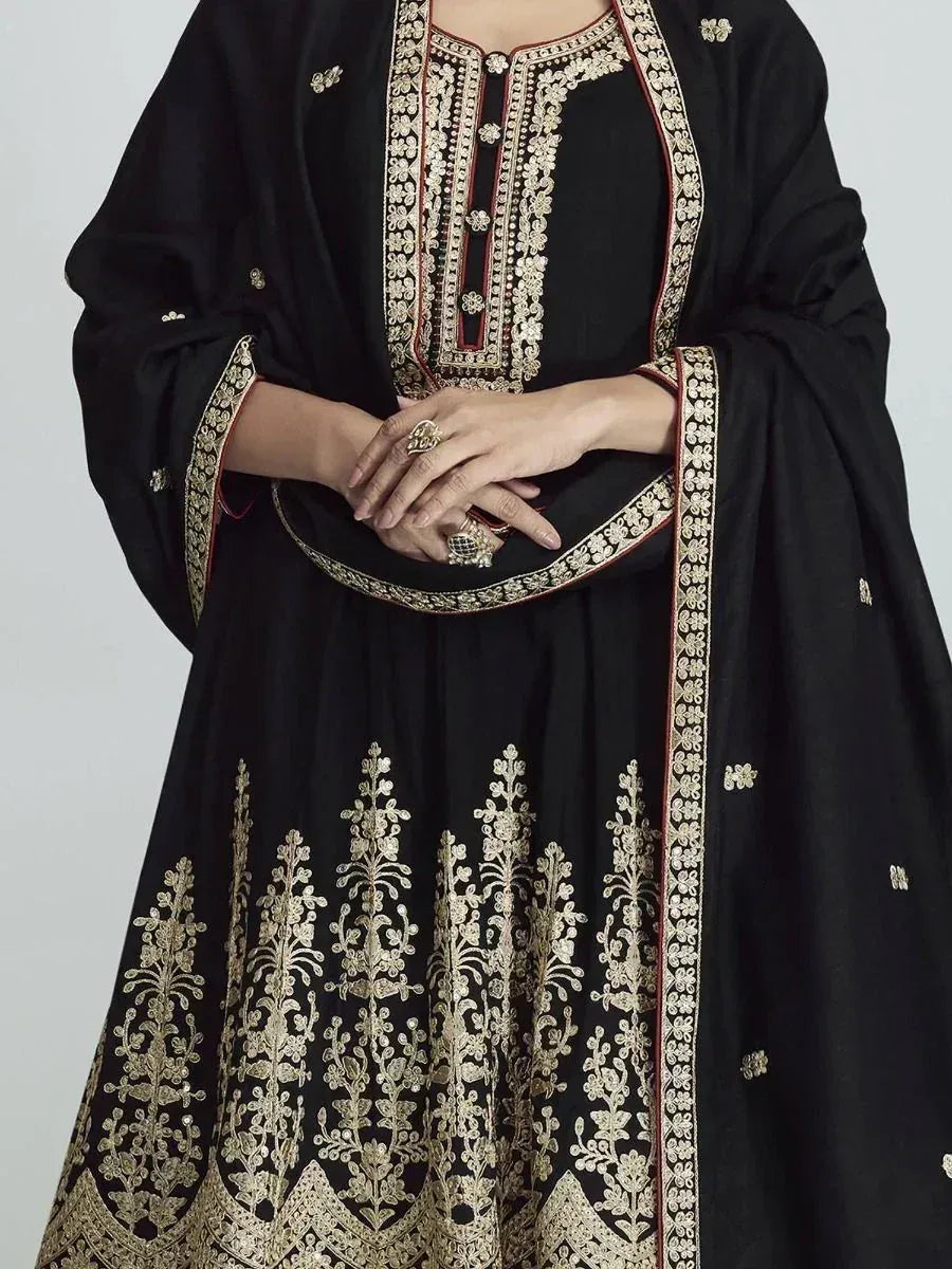 Black ethnic anarkali with gold embroidery, perfect for Indian occasions and festive wear.