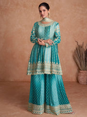 Woman in teal embroidered designer ethnic suit with palazzo pants, Ethnic Plus collection