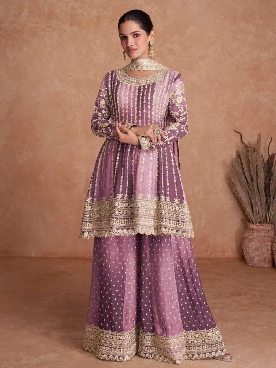 Purple embroidered designer salwar kameez with gold detailing, perfect for Indian ethnic occasions