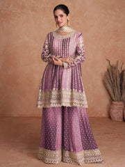 Woman in purple embroidered Indian ethnic suit with palazzo pants from Ethnic Plus