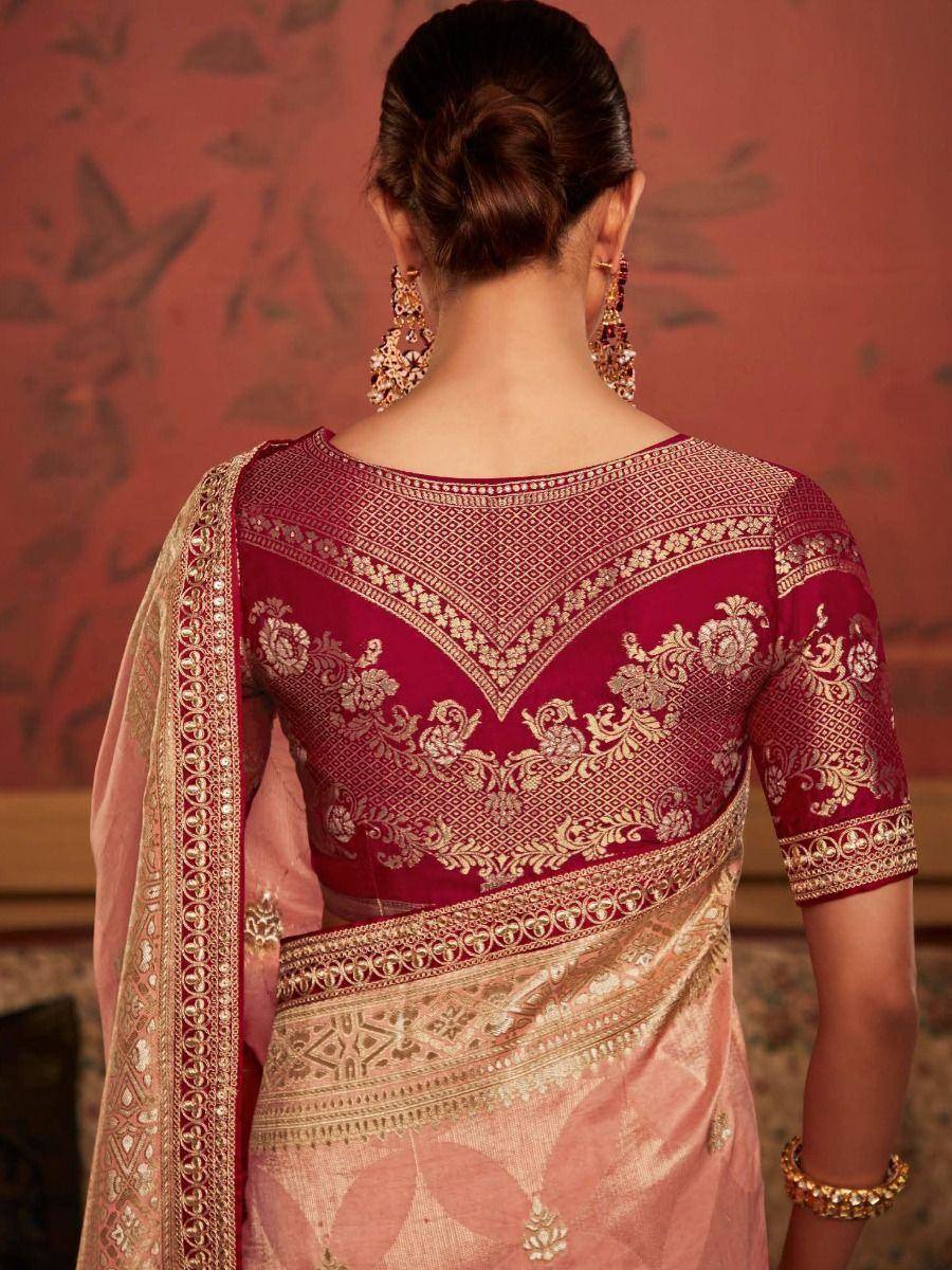 Maroon and gold embroidered saree with detailed back design, perfect for Indian ethnic wear occasions