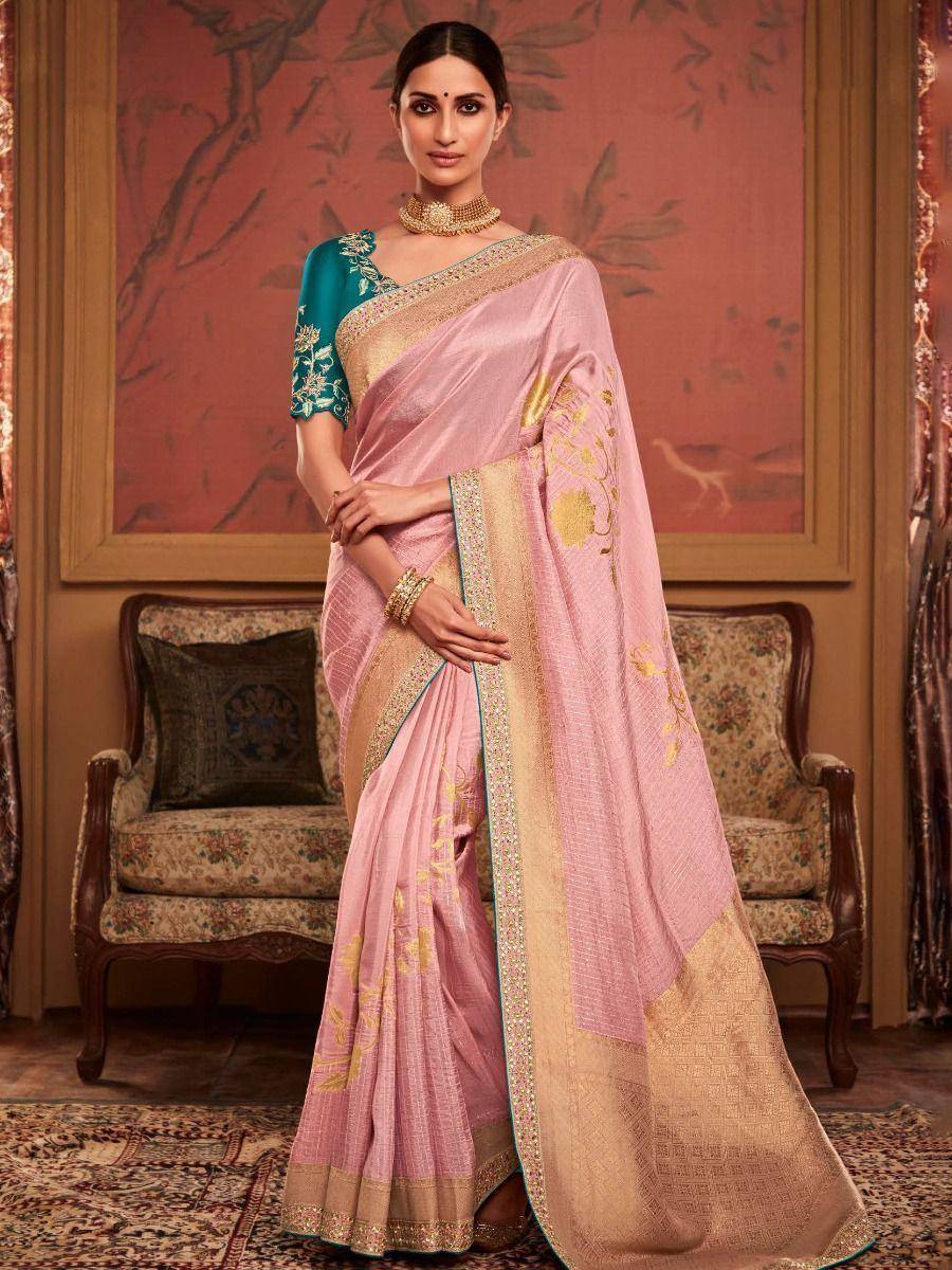 Pink saree with gold embroidery and teal blouse, elegant Indian ethnic wear