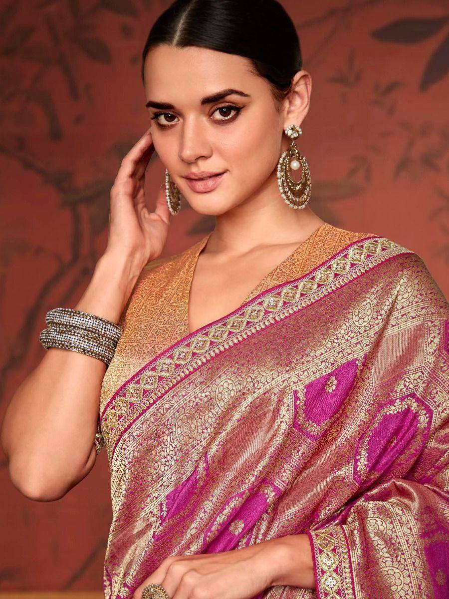 Elegant pink and gold designer saree with intricate embroidery, perfect for Indian ethnic wear occasions.