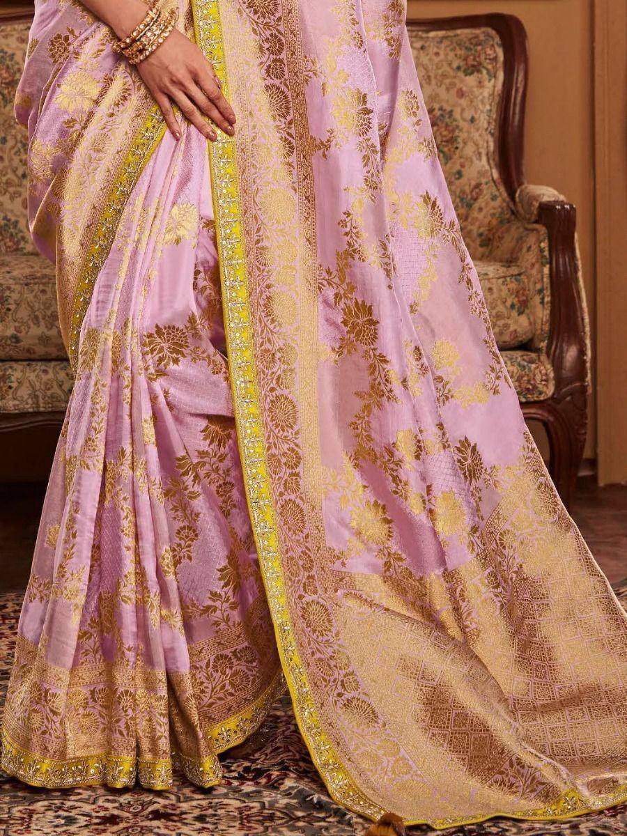 Pink floral saree with gold zari border, elegant Indian ethnic wear for women