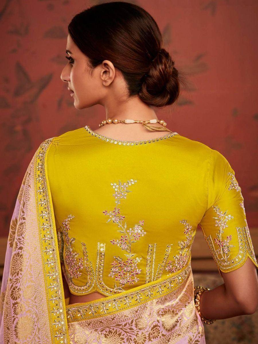 Yellow embroidered designer saree blouse with floral detailing, perfect for ethnic occasions