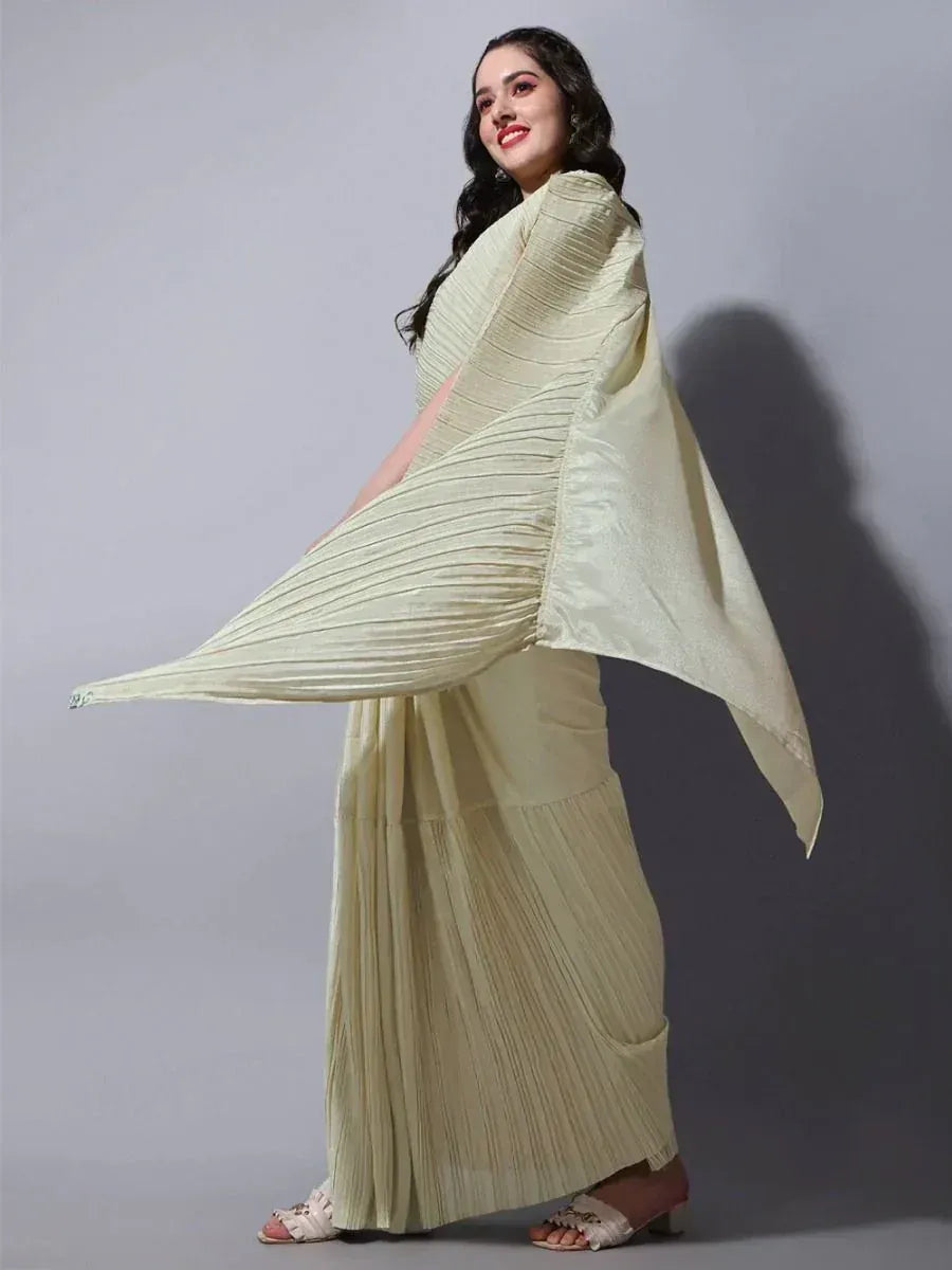 Elegant pleated ethnic gown in soft green, perfect for Indian occasions and festive wear.