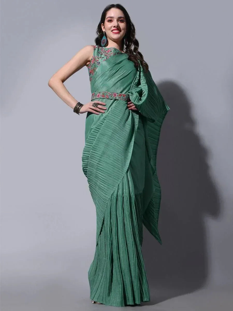 Green pleated saree with floral embroidery, perfect for Indian ethnic wear occasions