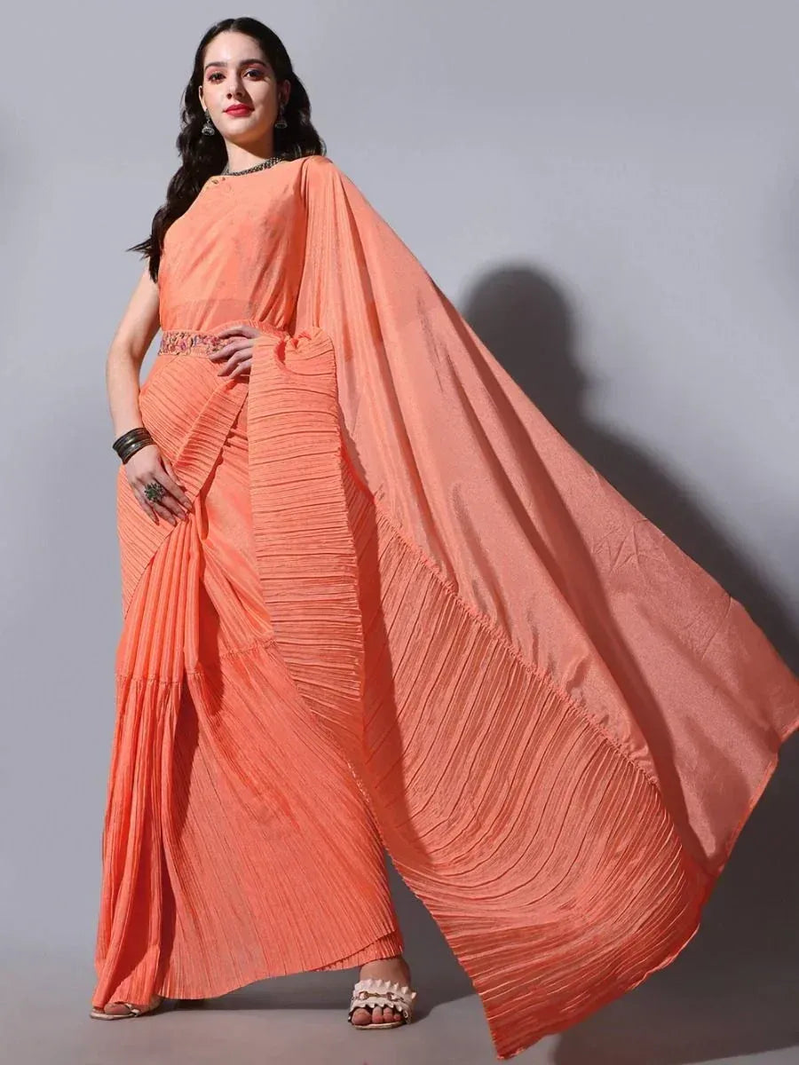 Orange pleated saree with embroidered belt, stylish Indian ethnic wear for women