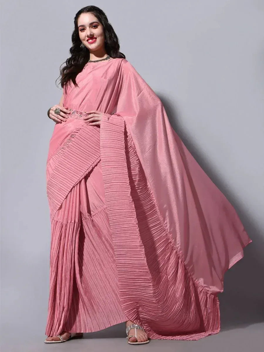 Pink pleated saree with shimmer fabric, styled for Indian ethnic wear occasions
