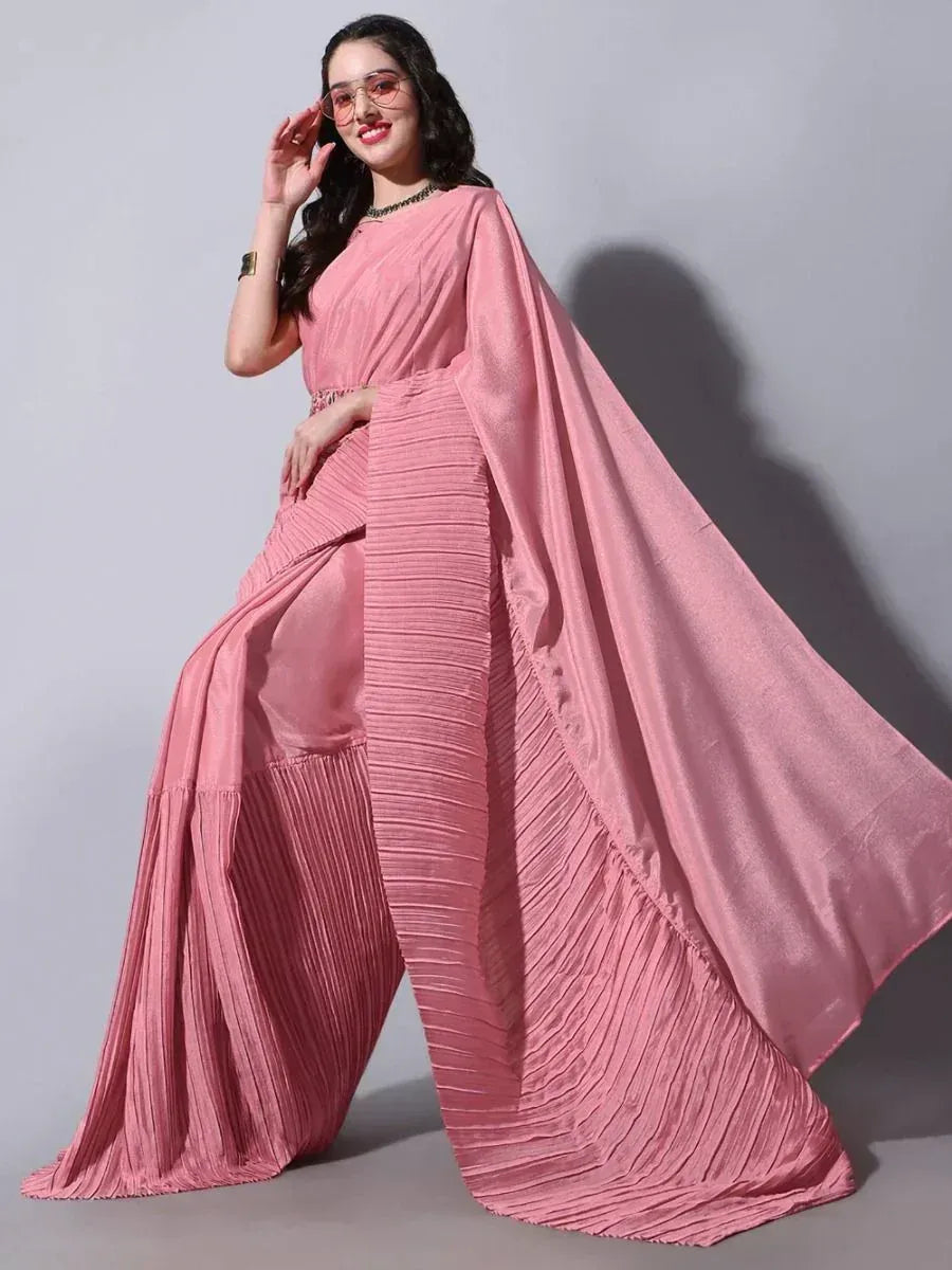 Pink pleated saree with flowing drape, stylish ethnic wear for women