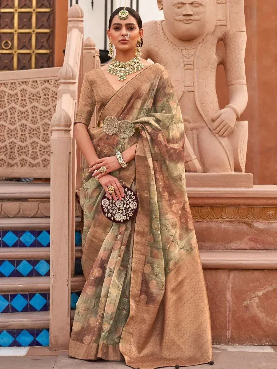 Elegant Indian saree with floral print, gold belt, and traditional jewelry, styled for ethnic occasions.