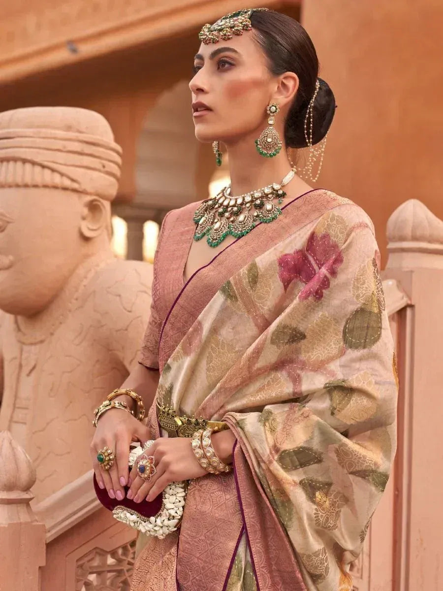 Elegant Indian saree with floral print, paired with traditional jewelry and styled for ethnic occasions.