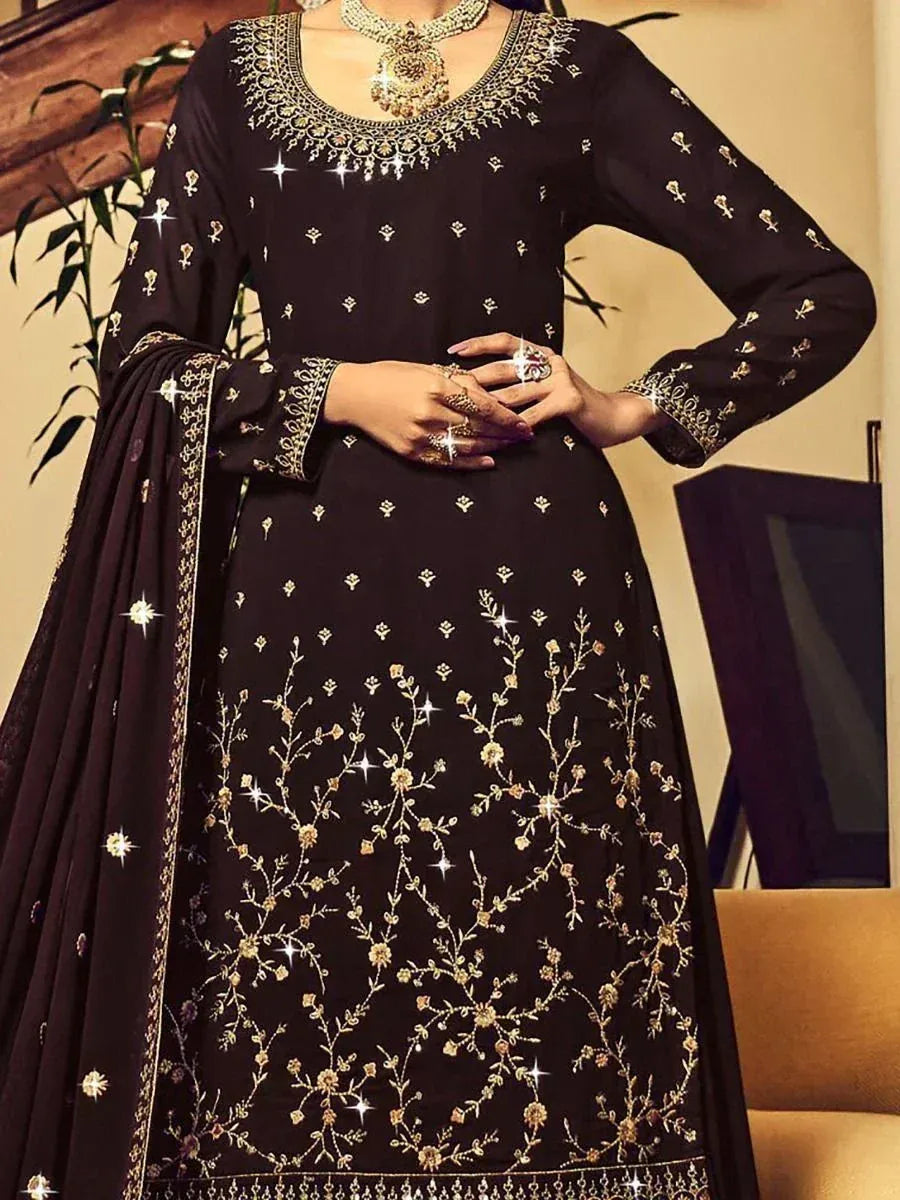 Black embroidered salwar kameez with gold floral work and matching dupatta, ideal for ethnic occasions.