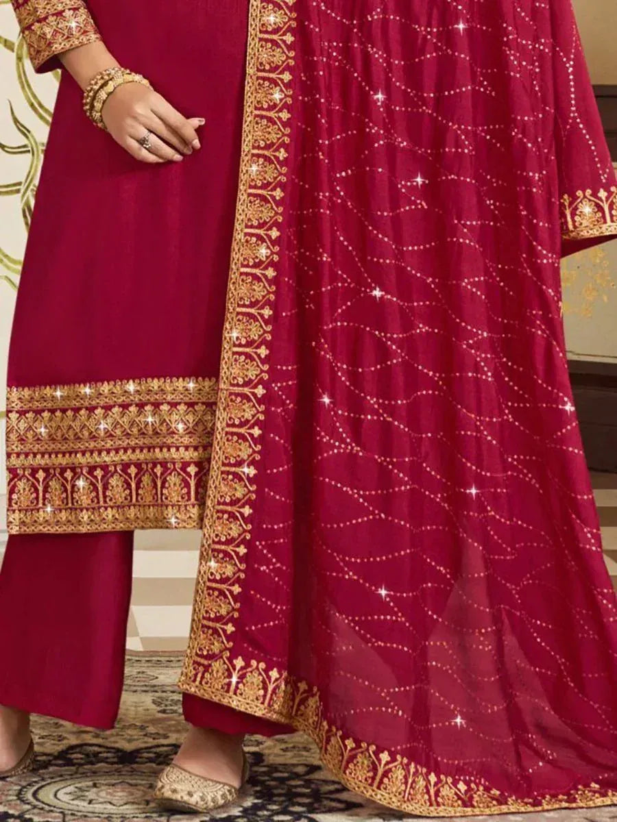 Maroon ethnic salwar kameez with gold embroidery and sequin work, perfect for festive occasions