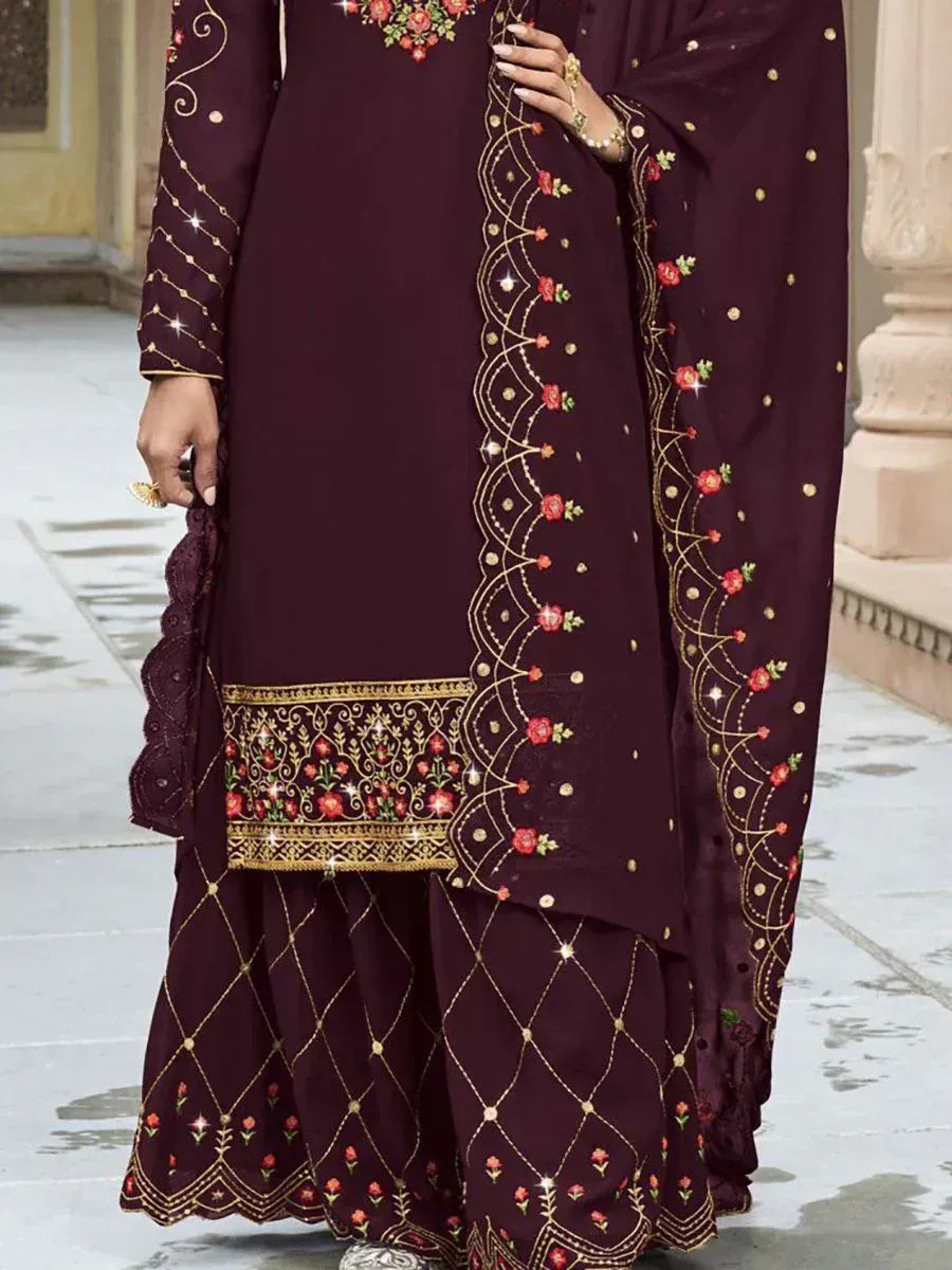 Maroon embroidered salwar kameez with gold and floral detailing, traditional Indian attire