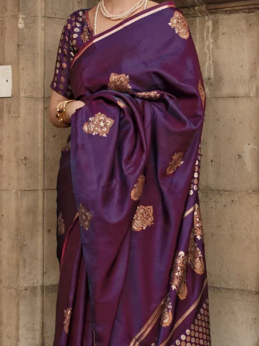 Purple silk saree with gold embroidery, perfect for Indian ethnic wear and festive occasions.