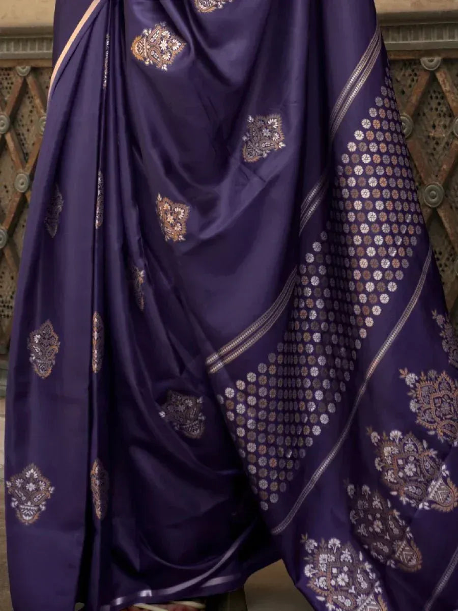 Purple designer saree with intricate paisley and floral embroidery, perfect for ethnic occasions