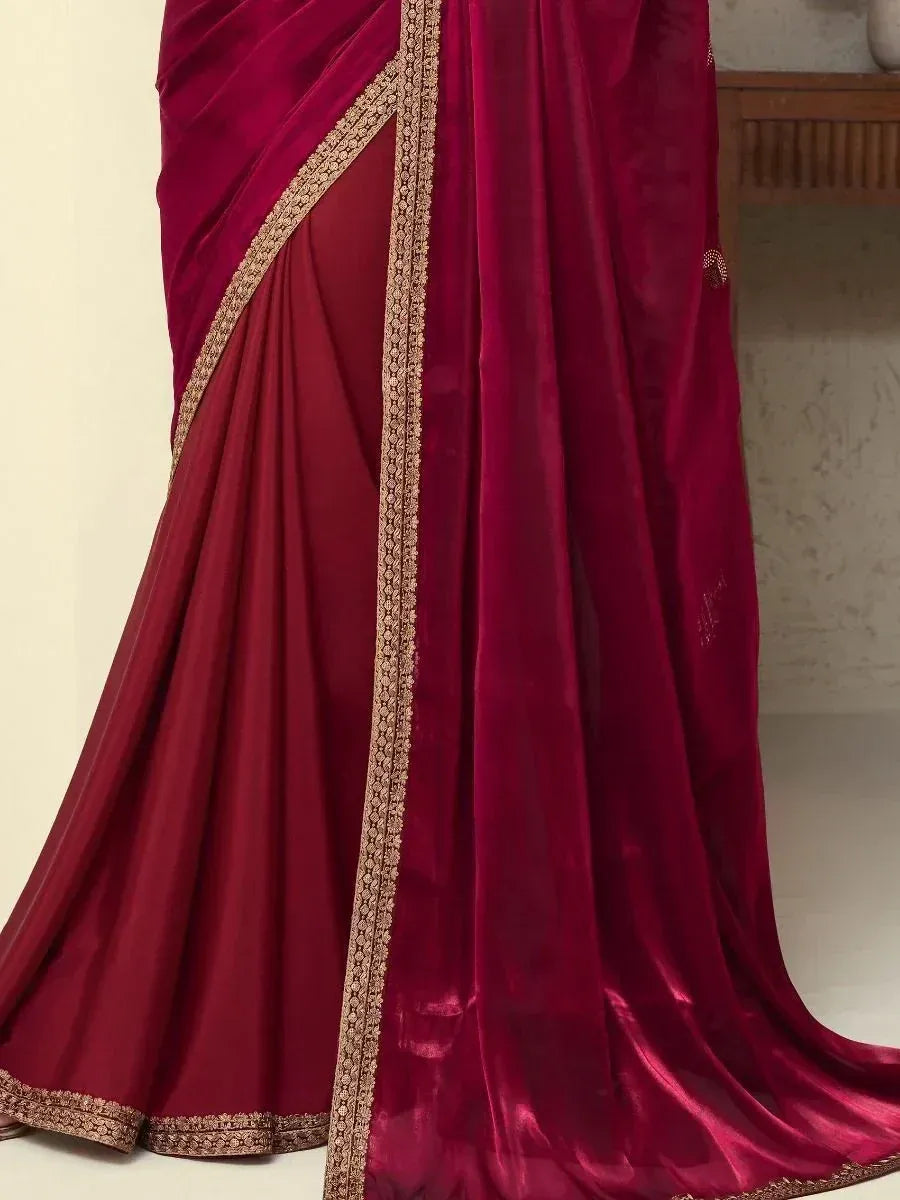 Rich maroon velvet saree with gold embroidered border, elegant Indian ethnic wear