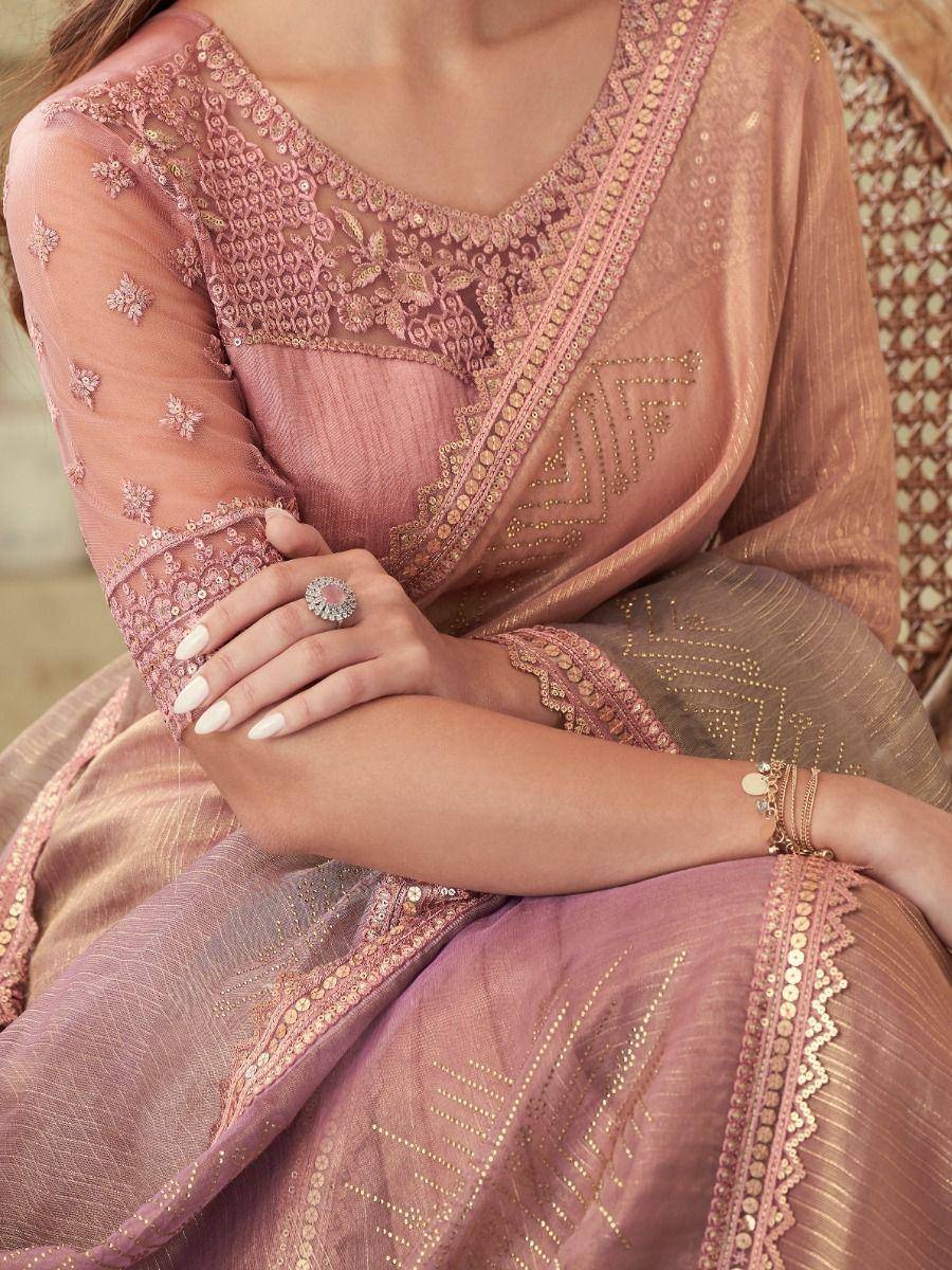 Pink embroidered ethnic gown with sheer sleeves and gold detailing, perfect for Indian occasions