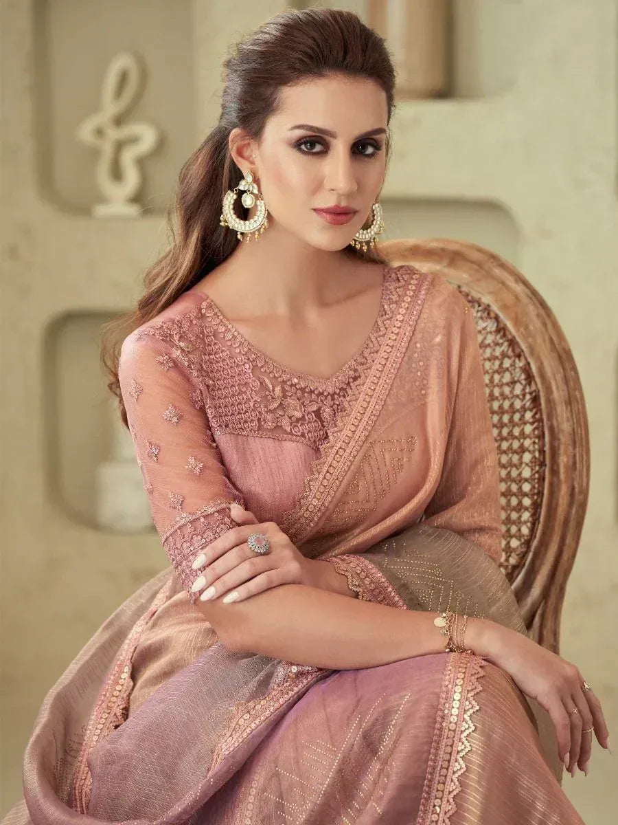 Elegant pink embroidered saree with designer blouse, perfect for Indian ethnic occasions