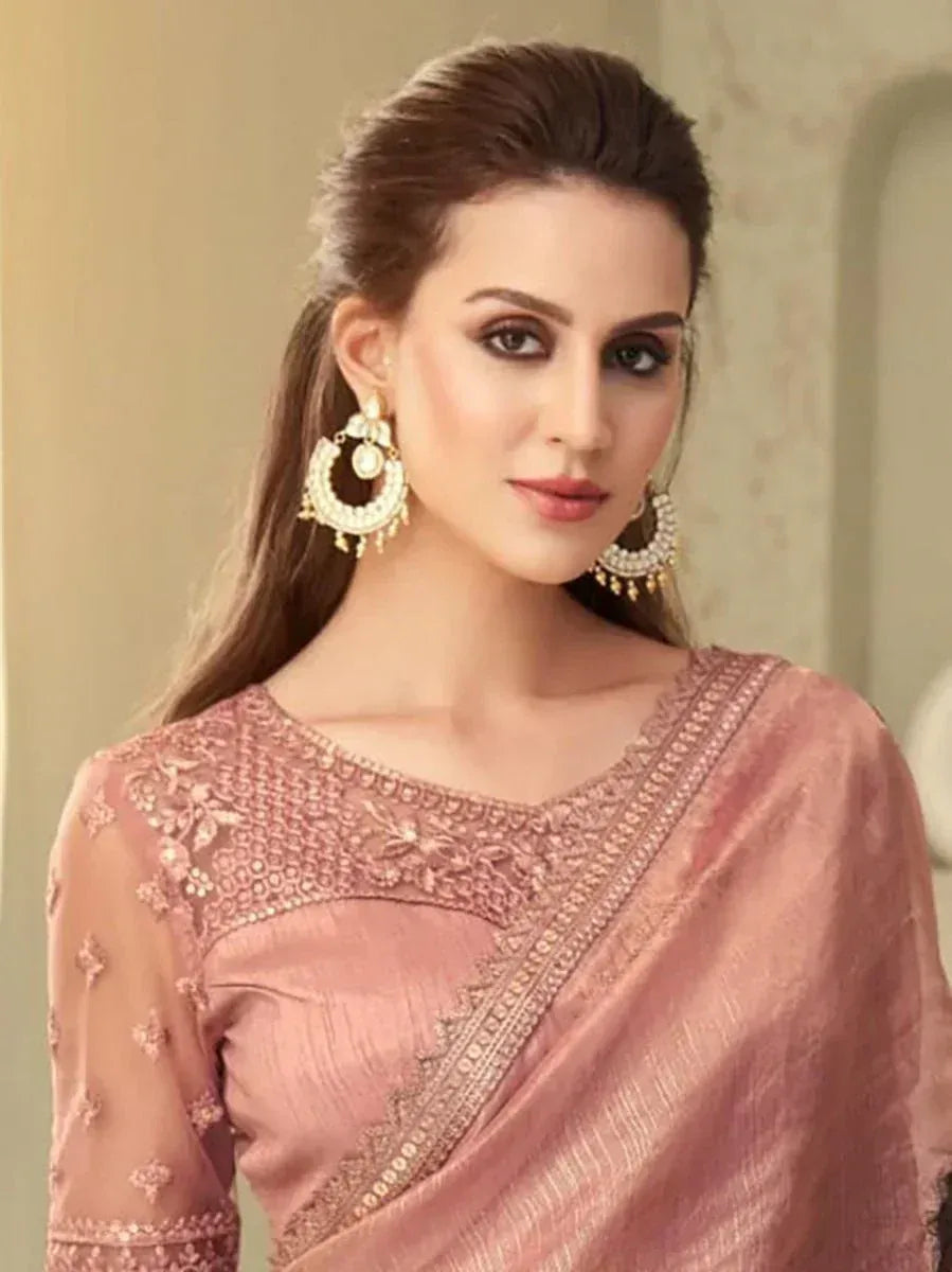 Pink embroidered saree with matching blouse and gold jhumka earrings, Indian ethnic wear