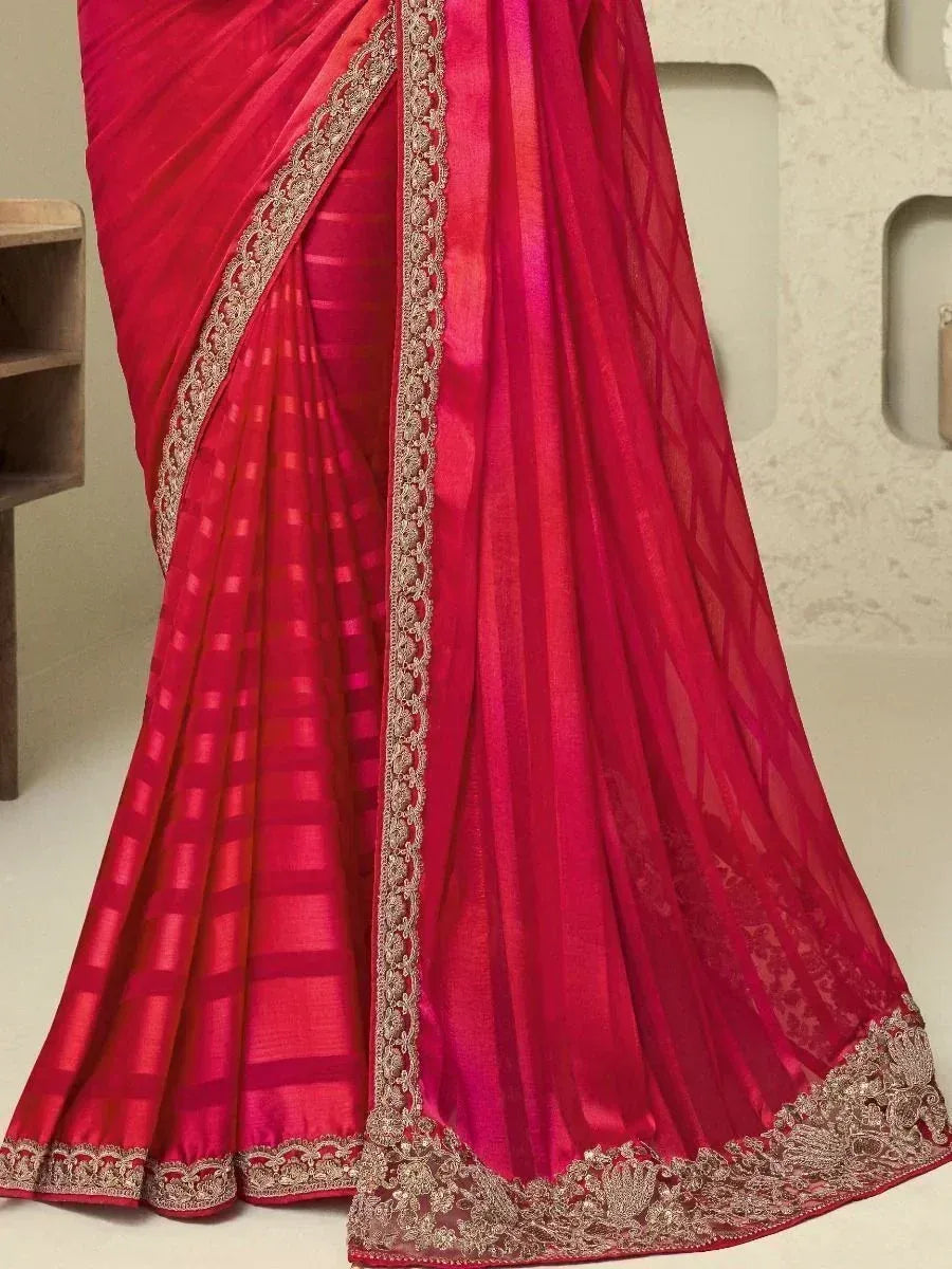Vibrant pink saree with gold lace border, perfect for Indian ethnic occasions