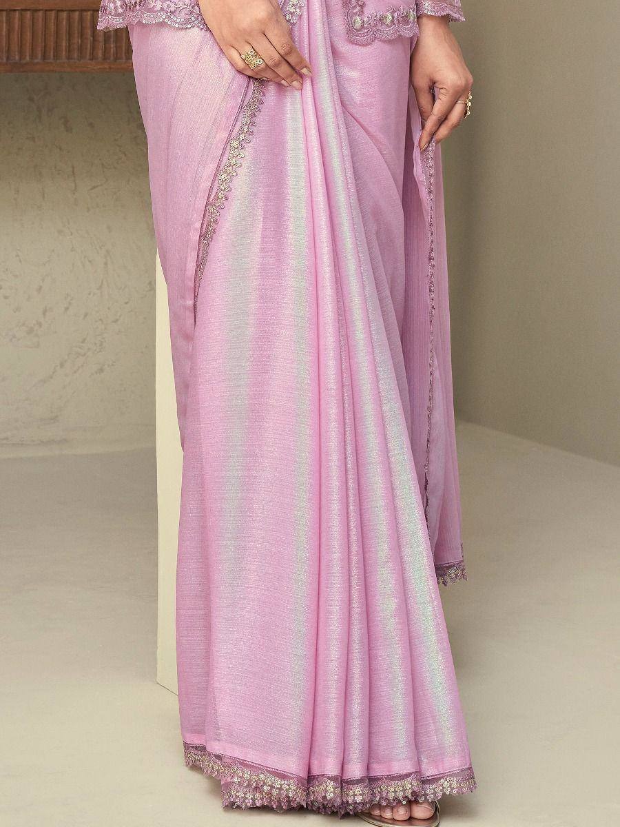 Pink designer saree with lace border and embellished blouse, ethnic Indian wear