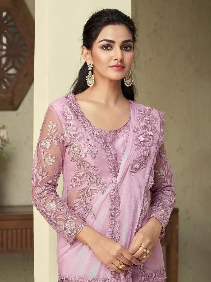 Elegant lavender ethnic gown with floral embroidery and sheer sleeves, perfect for Indian occasions