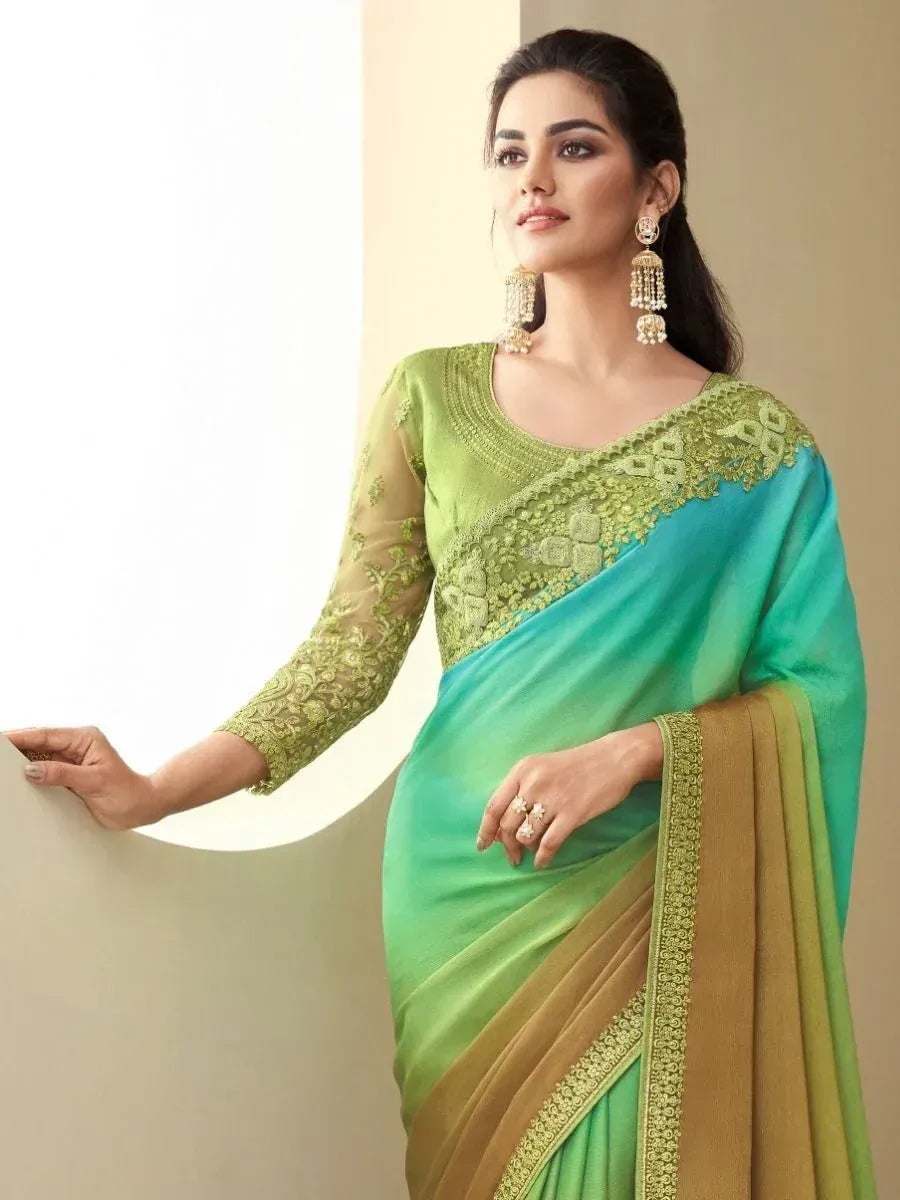Elegant green and teal saree with embroidered blouse, perfect for Indian ethnic wear occasions.