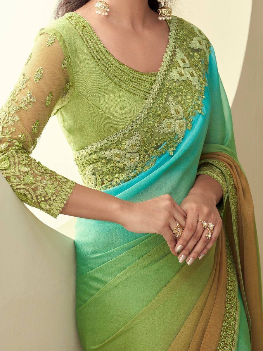 Green and turquoise designer saree with intricate embroidery and sheer sleeves
