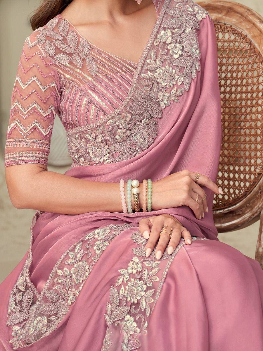 Elegant pink saree with floral embroidery and sequin detailing, perfect for Indian ethnic wear