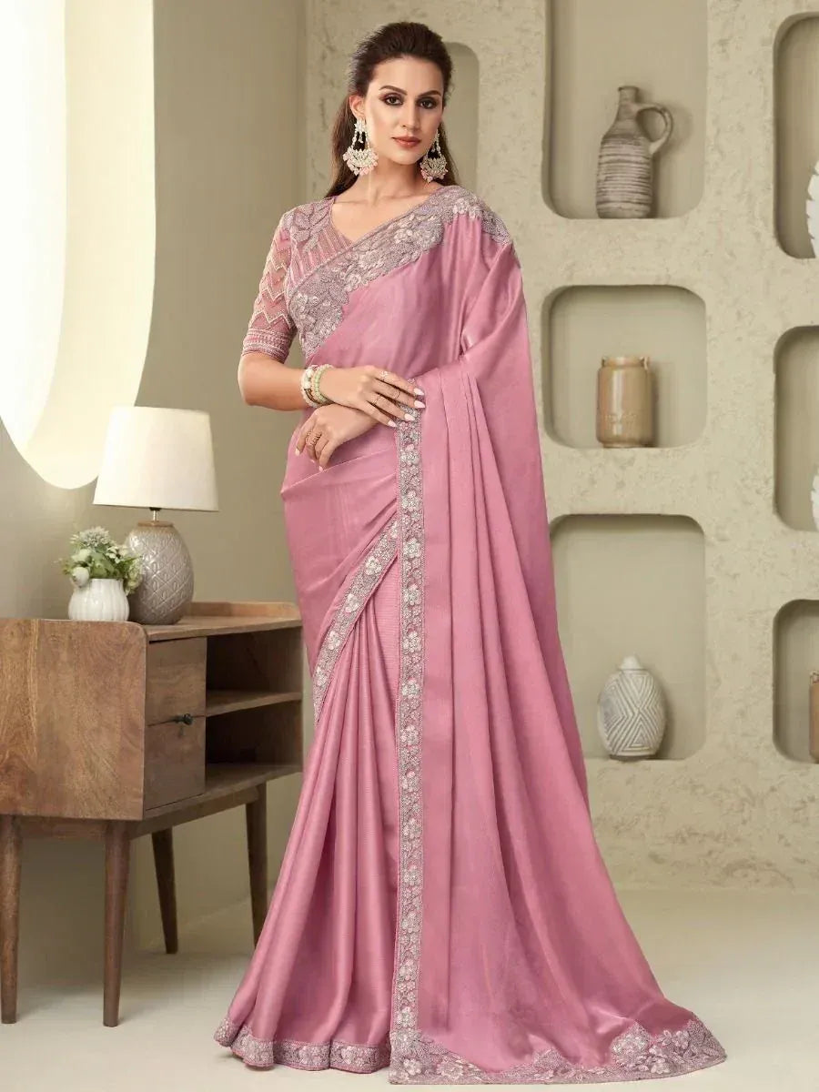 Elegant pink saree with intricate embroidery and designer blouse for Indian ethnic wear
