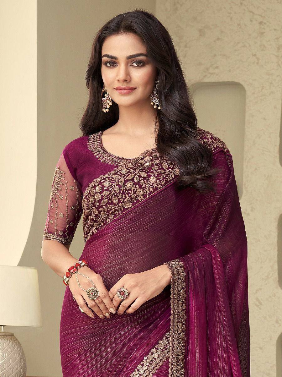 Elegant maroon saree with gold embroidery, perfect for Indian ethnic occasions and festive wear.