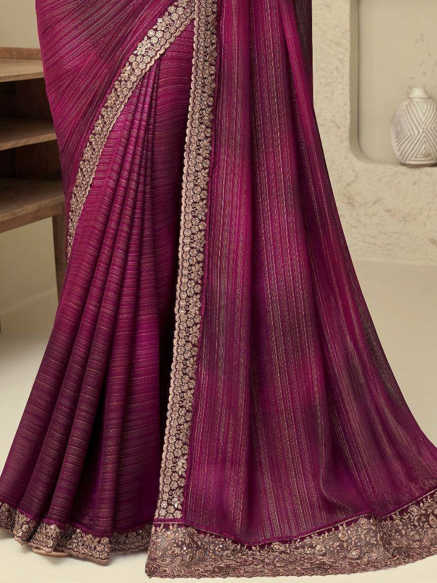 Purple ethnic saree with gold floral border, designer Indian wear for festive occasions