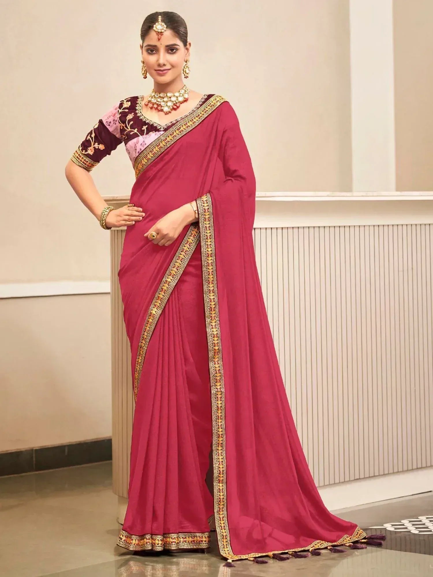 Elegant maroon saree with gold border and embroidered blouse, perfect for Indian ethnic occasions